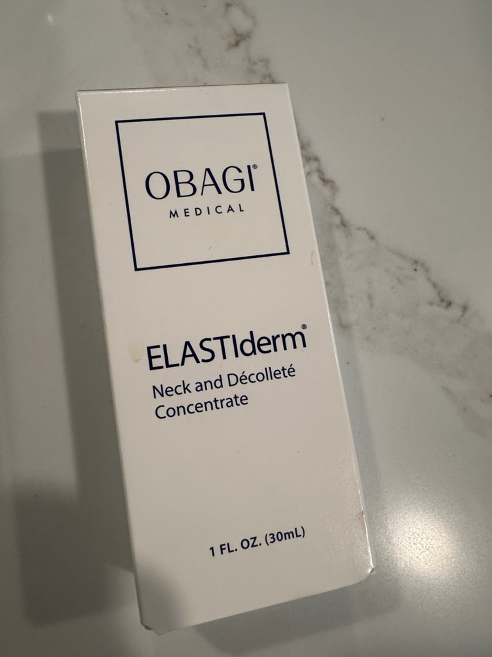 Obagi ELASTIderm Neck and Décolleté Concentrate - White with Navy Text
